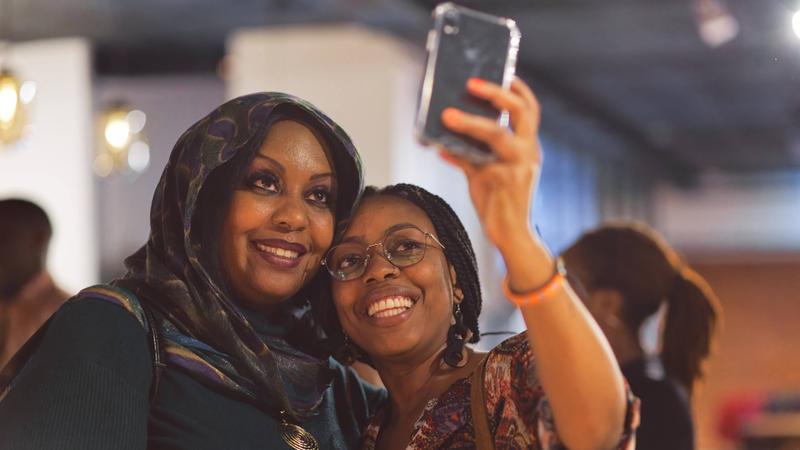 Two Black women take a selfie